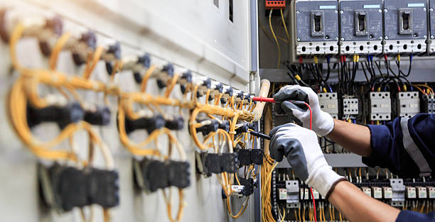 Professional Electrician technician working in North Patchogue, NY